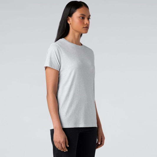 A light grey t-shirt with short sleeves displayed on a model. It features a branding logo.
