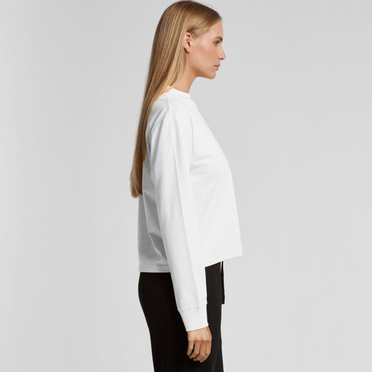 A white long-sleeve tee displayed on a model, featuring a relaxed fit and a simple design, with a logo present.