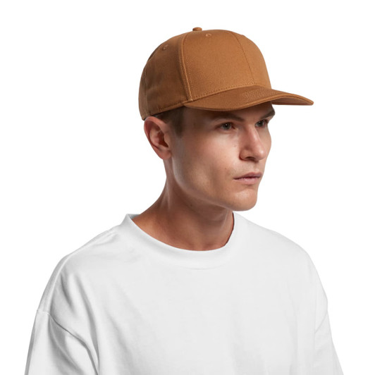 A brown canvas cap featuring a structured design and a logo, paired with a plain white T-shirt.
