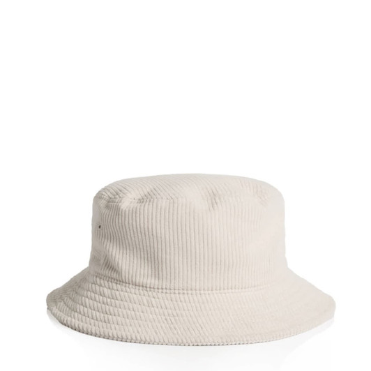 A cream-coloured bucket hat with a cord texture and a logo on the side.