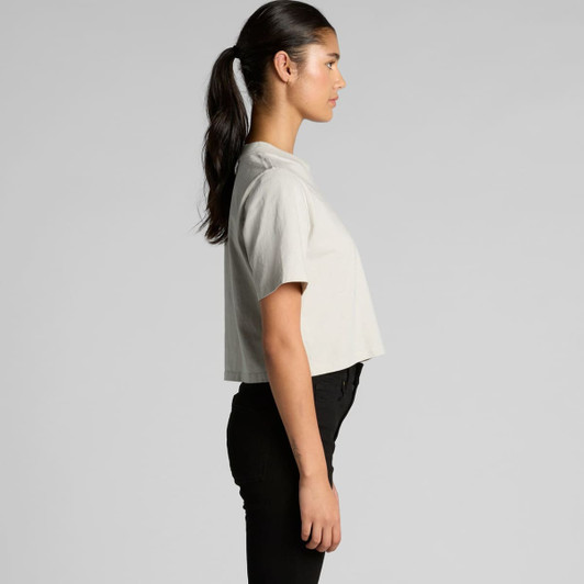 A cropped grey t-shirt displayed on a model, featuring a side profile view and a simple design.