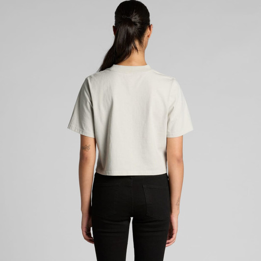 A cropped, faded tee in light grey, displayed from the back, with a plain design and short sleeves.