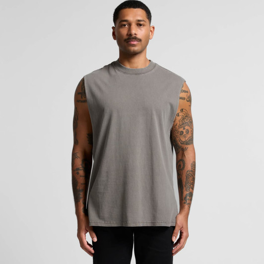 A sleeveless grey tank top with a loose fit, featuring a logo and a model showcasing its style.