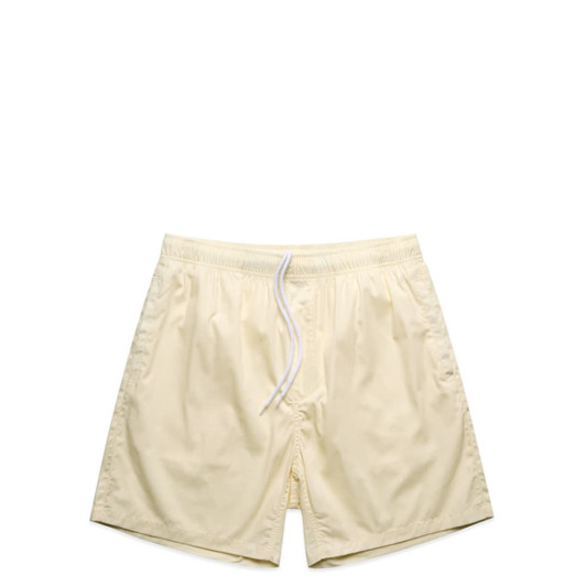 Light yellow beach shorts featuring an elastic waistband and drawstring, with a logo on the side.