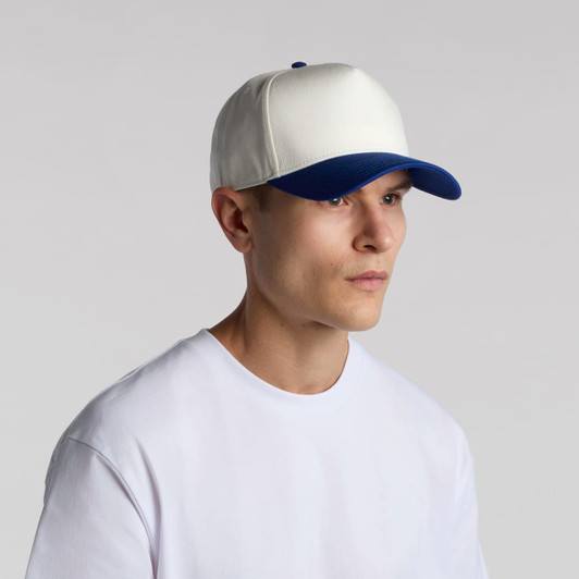 A two-tone cap featuring a white front and blue peak, designed with a logo.