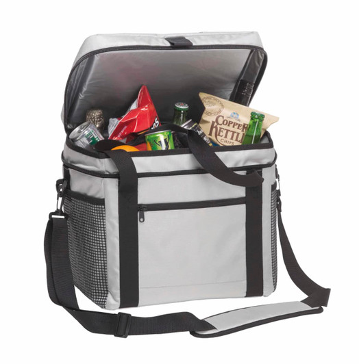 A grey cooler bag with a black strap, filled with drinks and snacks. It features a mesh pocket and a logo.