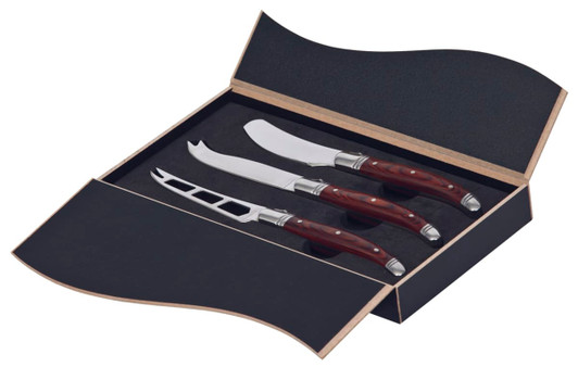 A set of three Bordeaux cheese knives with silver blades and dark wooden handles, packaged in a stylish black box.