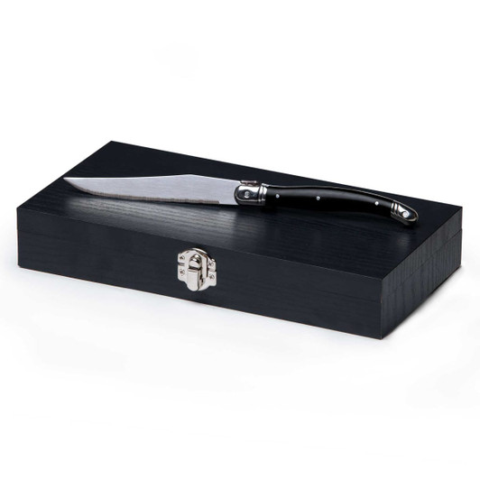 A six-piece knife set with stainless steel blades and black handles, presented in a sleek black wooden box.