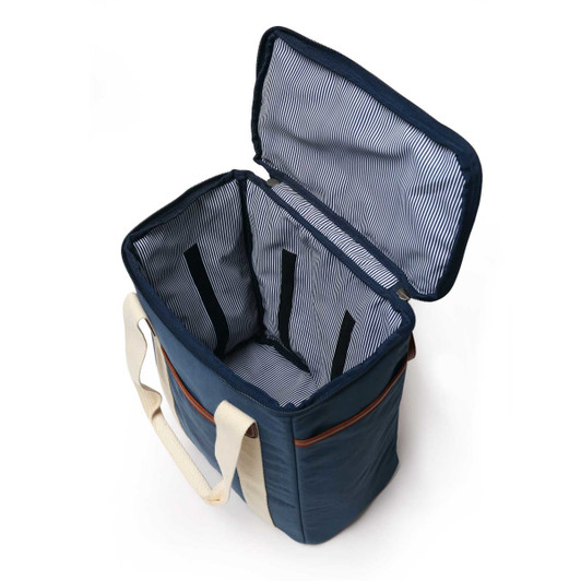 A wine cooler bag in navy blue with a striped interior and two compartments, featuring a cream-coloured strap and a logo.