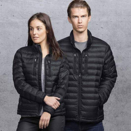 A black puffer jacket worn by a man and a woman, featuring a branding logo and zippered pockets.