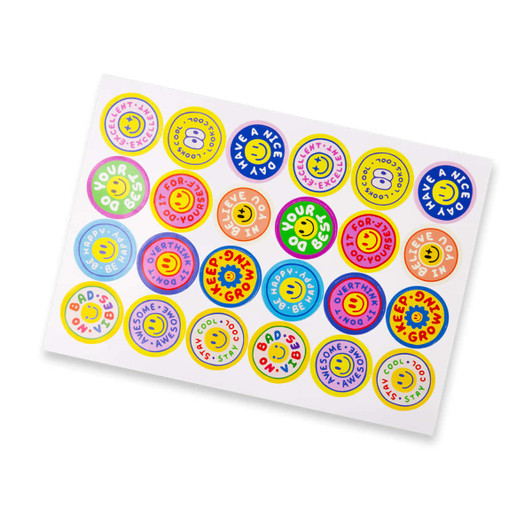 A sticker sheet featuring various 44mm glossy circle stickers in vibrant colours with smiley faces and fun designs.