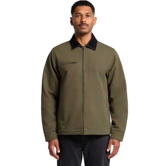 A male model wearing a green canvas cord collar jacket with a front zip and pocket. The jacket has a black collar.