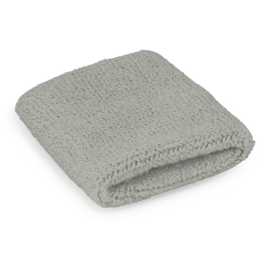 A grey wrist sweat band folded neatly, showcasing a textured fabric with an elastic design. It features a logo branding.