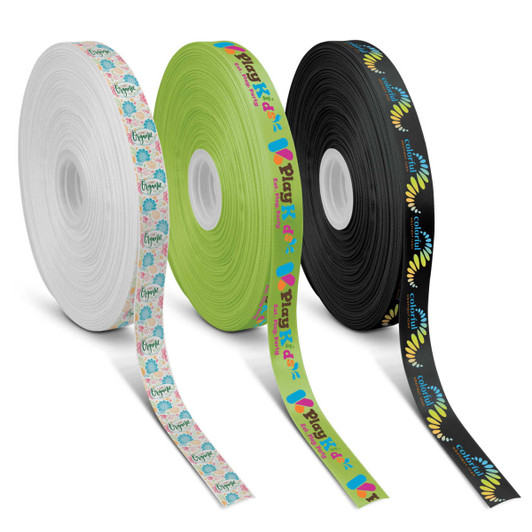 Three rolls of 20mm personalised ribbon in white, green, and black, featuring various patterns and a logo.