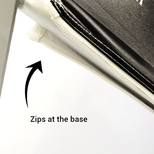 A close-up of a media wall's zipper mechanism at the base, featuring a black fabric edge.