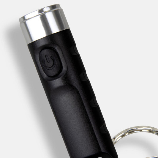 A rechargeable torch keyring in black with a silver top, featuring a power button and a keyring attachment.