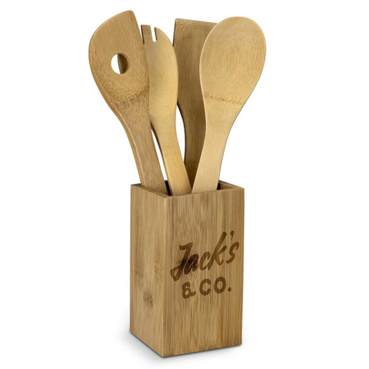 Bamboo kitchen utensils in a natural bamboo holder, featuring a spoon, fork, and spatula-like tool.