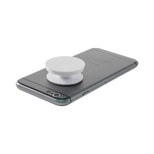 A white pocket socket phone stand rests on the back of a dark grey smartphone, featuring a minimalist design.