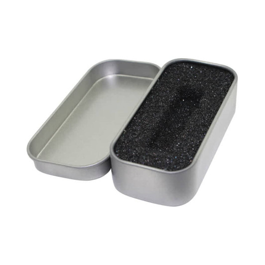 A silver tin box with a removable lid, featuring a black foam interior for pen packaging.