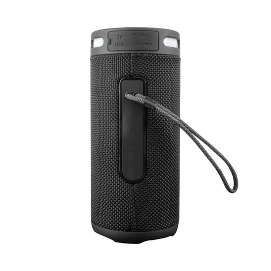 A black wireless speaker with a textured surface, featuring a carry strap and a logo on the side.