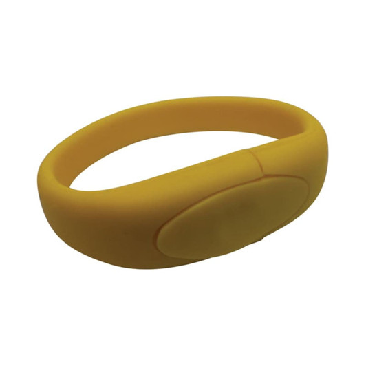 A yellow silicone wristband with a smooth surface and an oval button-like feature. It has a minimalistic design.