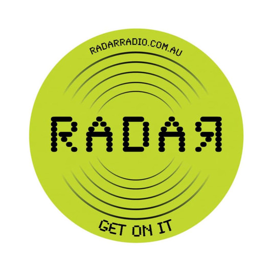 Bright green PVC coaster with a circular design featuring a logo and sound wave pattern.