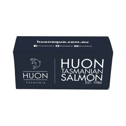 A dark blue customised box featuring a logo and branding for Huon Tasmanian Salmon.