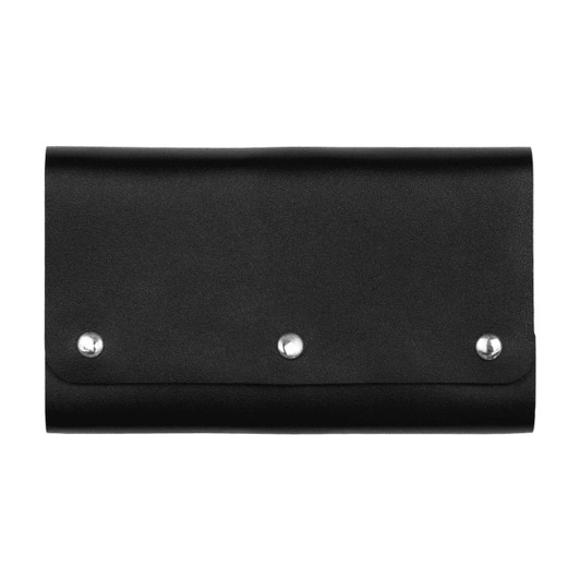 A black leather travel card set with three metal studs, featuring a sleek, folded design.