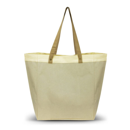 A large market tote bag in beige with light yellow accents and sturdy brown handles. It features a branded logo.
