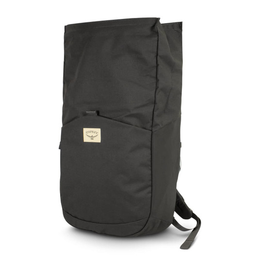 A dark green roll-top backpack with a logo on the front and adjustable straps.