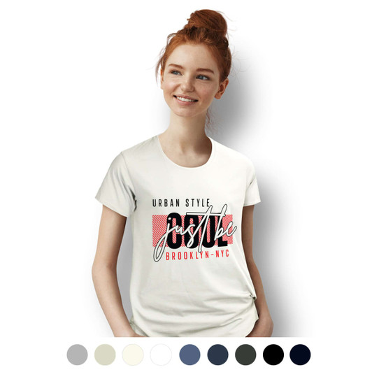 A women's white T-shirt featuring a graphic design with urban style text. The model has red hair and a casual pose.