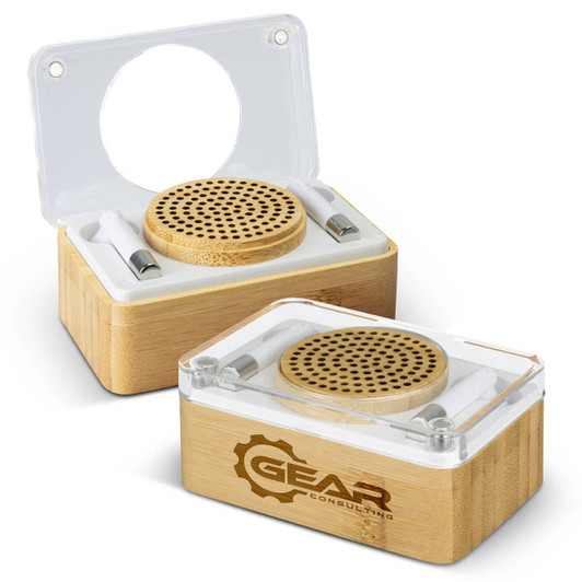 A bamboo wireless speaker and earbud set in a clear case, featuring a wooden speaker grille and a logo on the base.
