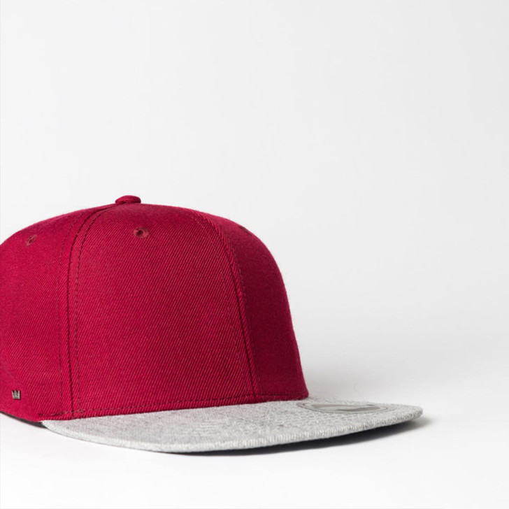 A maroon cap with a grey brim, featuring a logo on the side. Suitable for casual or sporty wear.