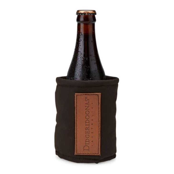 A drink bottle wrapped in a brown stubby holder with a logo. The bottle shows condensation, indicating it's chilled.