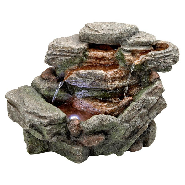 The Waterfall Creek Cascading Garden Fountain is part of Design Toscano's Small Wonders collection of tabletop fountains, perfectly sized to be placed anywhere, from a deck to a patio or bring the sweet sound of water music inside in an office or in the bedroom. Cascading streams of water flow down into multiple pools to create an in-home oasis and peaceful, natural atmosphere. With the basin pool highlighted by an included LED light kit, you can even enjoy this garden fountain in the evening. It can be placed indoors or out and constantly recycles water from a hidden reservoir. Cast in quality designer resin and hand-finished to replicate natural stone, this garden fountain also features a UL-listed indoor/outdoor pump. A special size, priced for any budget, our Small Wonders fountains will make a delightful gift for yourself or a friend. Simple assembly required. 13Wx6&frac12;Dx8H. 4 lbs.