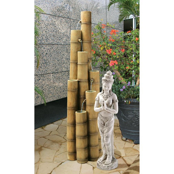 Put the finishing touch on a special spot in your garden with the sparkling water music of this traditional, Asian-inspired fountain that gently spirals downward through seven bamboo pillars. Cast in quality designer resin, this Design Toscano-exclusive functional work of decorative art is perfect for a meditation garden or a peaceful oasis and features an integrated, UL-listed pump. Shown with our Thai Teppanom Beautiful Being Statue: KY1459 14&frac12; Wx13&frac12; Dx57&frac12; H. 51 lbs.