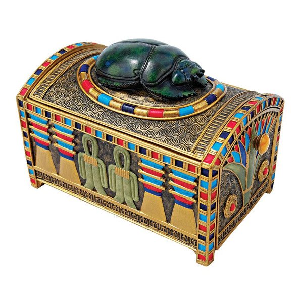 This clever Egyptian scarab box boasts two royal secrets to hide your treasures a compartment hidden under its liftable lid and an undisclosed side drawer! Covered with Egyptian imagery from its scarab amulet to its hieroglyphics, this Design Toscano work is cast in quality designer resin and hand-painted in the rich Egyptian palette. 3&frac12;Wx5Dx4&frac12;H. 2 lbs.