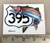 4"x3" 395 sign with Rainbow Trout swimming around it.