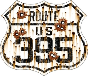 395 sticker that says that looks old and rusted with bullet holes