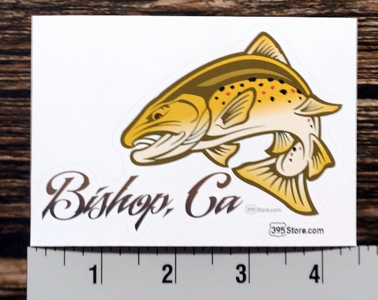 Jumping brown trout sticker that says "Bishop, CA"