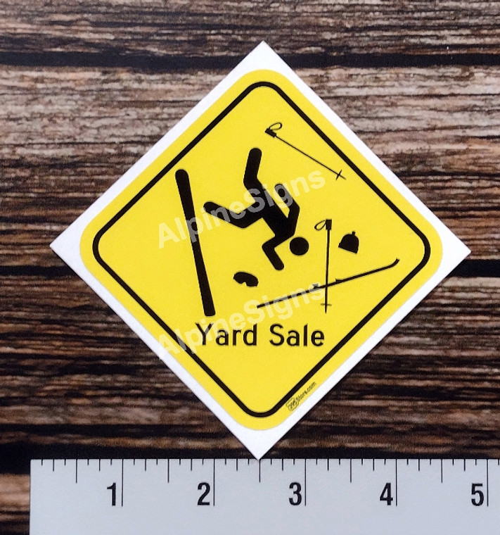 Humorous sticker that shows a skier crashed