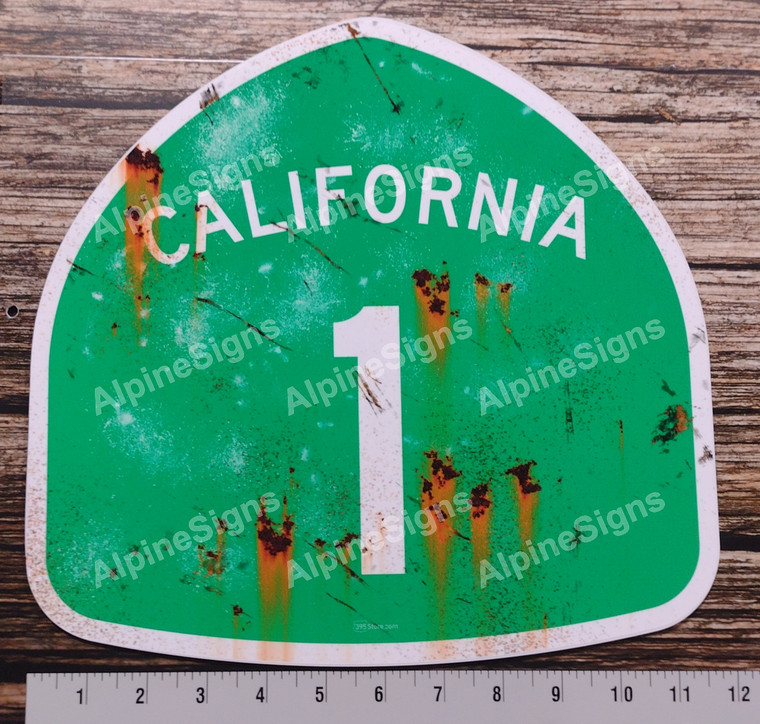 California Highway 1 sign that looks weathered, rusty and distressed