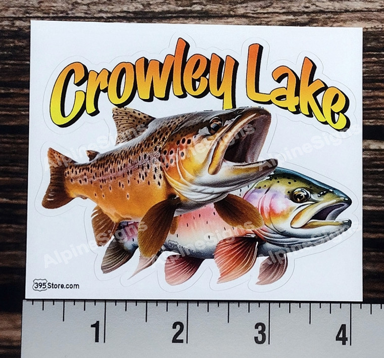 This trout fishing sticker is a realistic image of a brown trout swimming with a rainbow trout. Top of sticker says "Crowley Lake"