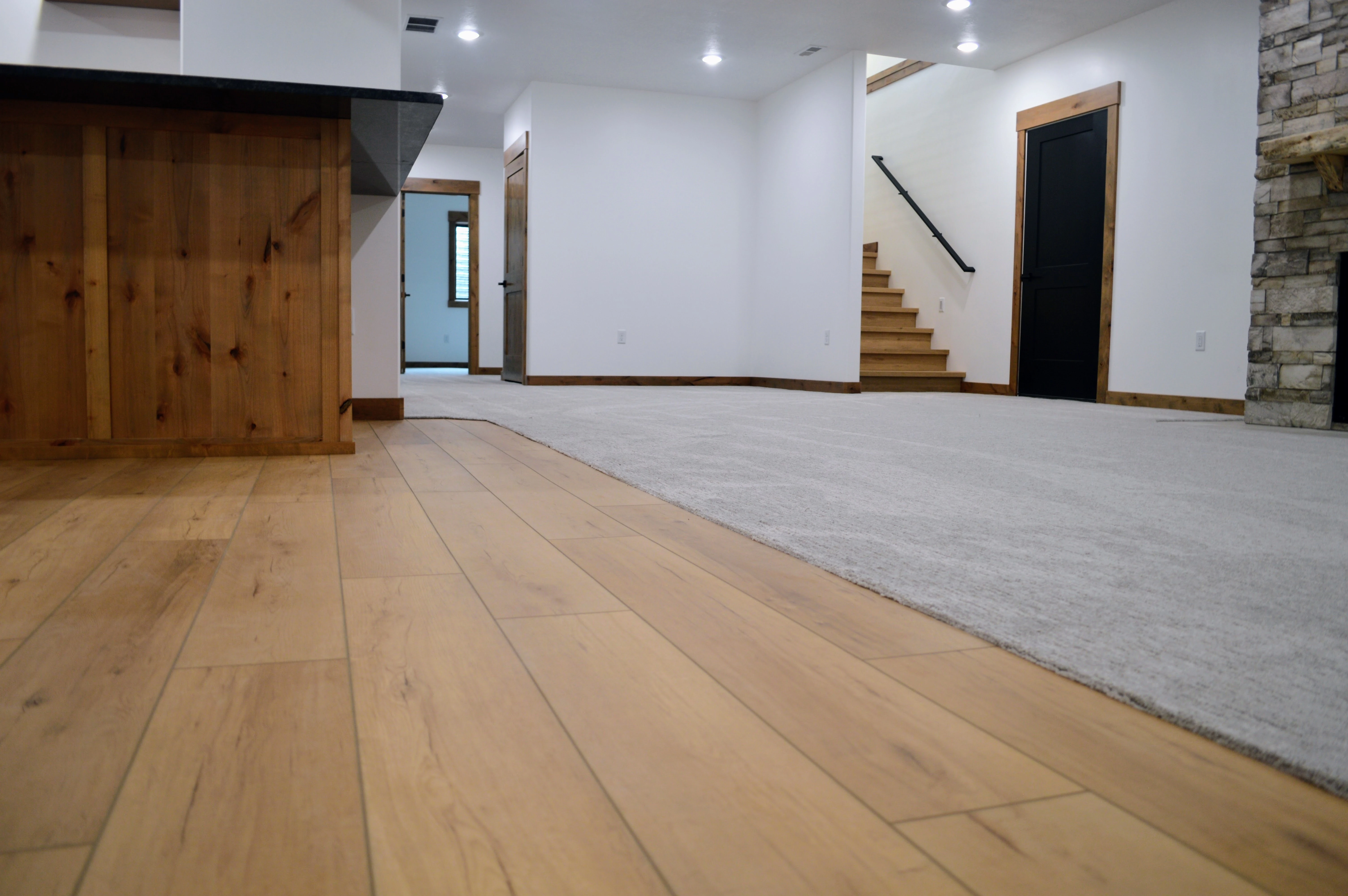 LVP and carpet combination in finished basement