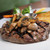 Dry Aged Sirloin Steak Topped with Mushrooms Dry Aged Sirloin Steak Topped with Mushrooms