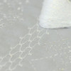 The delicate sparkle of the glitter stands out when used in a kuguri zashi that gives the impression of flowing water.