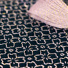 Sashiko lamè thread, Yozakura (Cherry Blossom at night), 40m, SL-15. Cherry blossoms continue to bloom at night, and when illuminated by moonlight, they take on a mysterious atmosphere that is different from the daytime. The color of the cherry blossoms seen at night and the light of the full moon filtered through them are expressed with gold glitter.