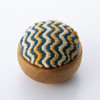 Kogin pincushion. Wave pattern in turquoise, white and mustard. Timber base. 