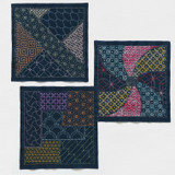 These distinctive sashiko samplers have been stencilled using both traditional and contemporary designs. Following the lines of the printed design, stitches of sashiko thread define the image.