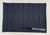 This sashiko placemat feature a traditional Japanese design and stitched in dark, moody tones, it makes a distinctive statement on your dining table. 
